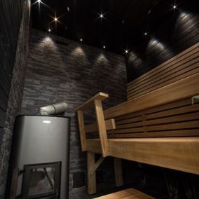 Moderni, tummasävyinen sauna